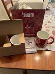 Bialetti Moka Deco Glamour Red Espresso 6 Cup Capacity With 2 Mugs Open. Price: $80.00.