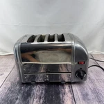 Dualit Slice Classic Toaster Polished Chrome Made In England BR/11EA86 1745W Used. Price: $170.00.