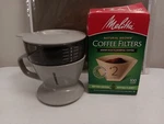 Starbucks-oxo Auto-drip Pour-over Coffee Maker + 99 Melita Filters Open. Price: $19.99.