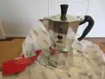 Bialetti Moka Express Iconic Italian Stovetop New Silver Espresso Maker - 6 Cups Open. Price: $34.99.