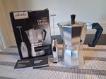 New Silver Chrome Primula Stovetop 6 Cup Espresso Coffee Maker And Milk Frother Open. Price: $29.99.