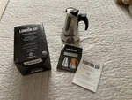 The London Sip 10 Cup Stainless Steel Stovetop Espresso Maker Silver Open. Price: $20.00.