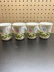 Primula Floral Coffee Mugs Set 4 Pink Blue Flowers Embossed Tea Cups Used. Price: $24.99.