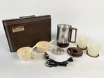 Traveler By Nesco 4 Cup Portable Coffee Maker Kit Hard Case - Vintage Used. Price: $11.99.