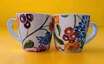 Set 2 Now Designs Vibrant Colorful Coffee Tea Mugs Cups Fruit And Flowers Used. Price: $15.99.