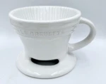 Le Creuset Pour Over Coffee Maker Cup Cone Filter Brewer White 3.5"H X 4.5"D Used. Price: $24.00.