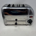 Dualit Slice Classic Toaster Polished Chrome Made In England BR/11EA86 1745W Used. Price: $139.87.